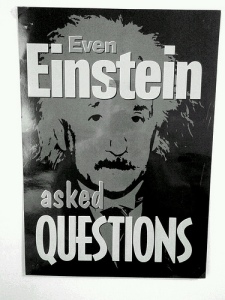 Poster of Albert Einstein with the following text:  Even Einstein asked Questions